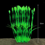 Artificial green aquarium plant with a measurement indicator on a black background