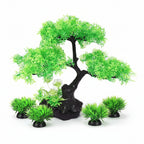 Artificial green tree and grass set on a white background