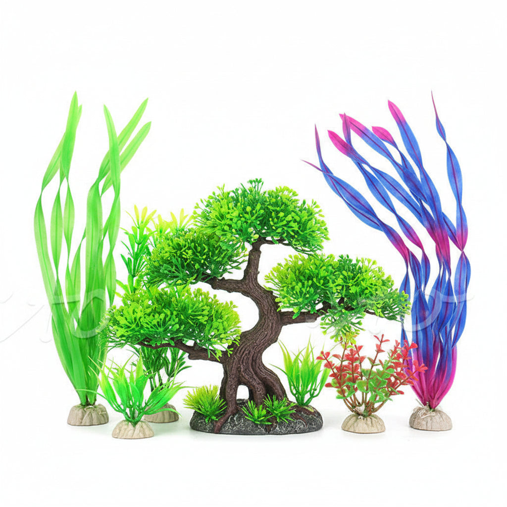 Collection of various artificial aquarium plants in different colors on a white background.
