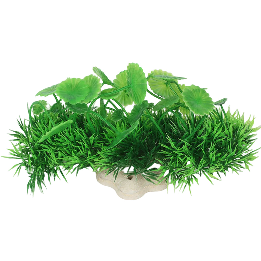 Artificial green plants with a measuring tape for scale on a white background