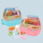 Children's aquarium toy set with fish and accessories on a light blue background