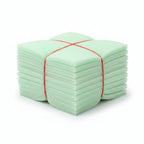 Stack of green cotton pads with a red band on a white background