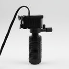 Black pump with a cord on a white background