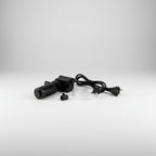 Black aquarium pump with power cord on a white background