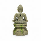 Statue of a seated Buddha figure on a white background