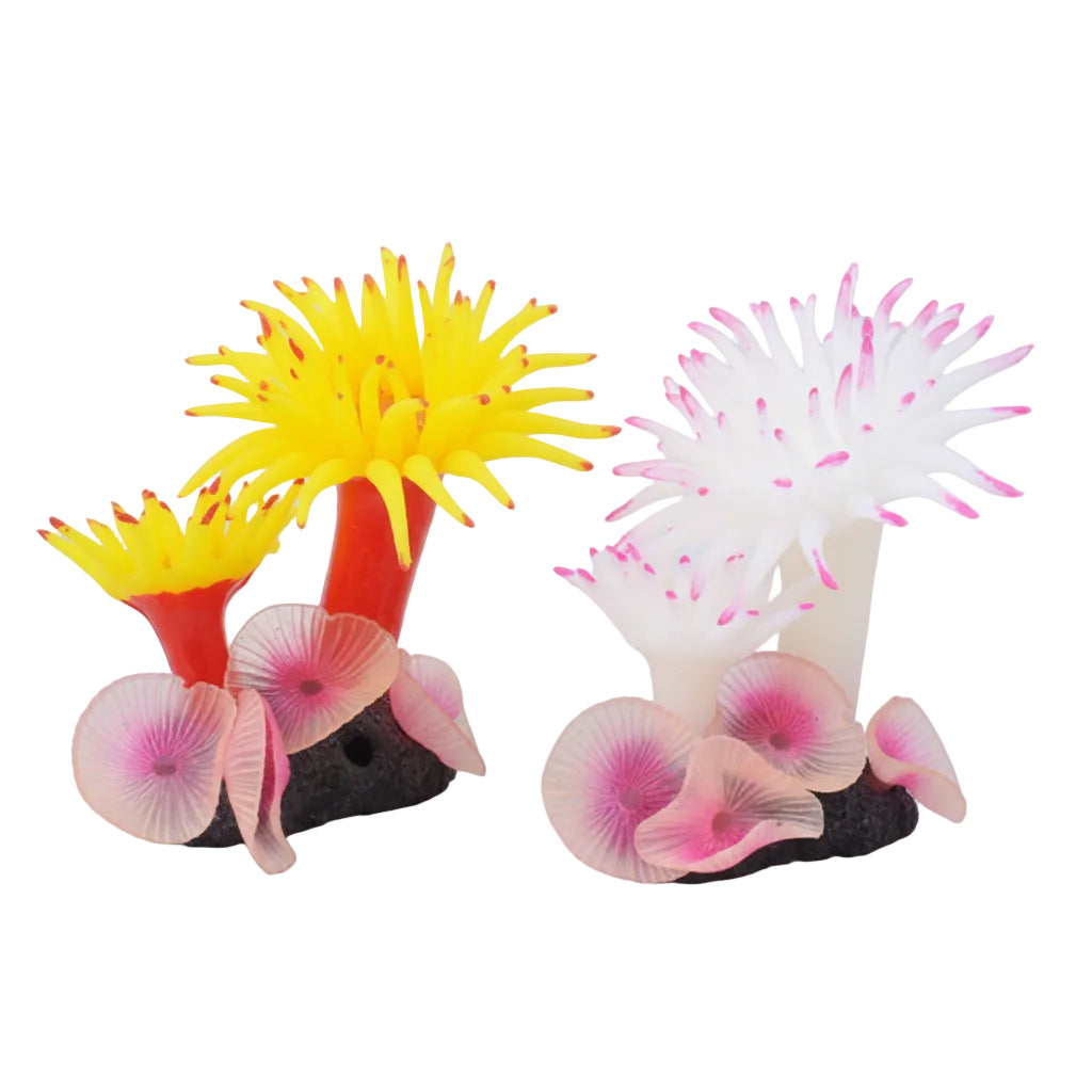 Decorative aquarium plants with yellow and pink colors on a white background